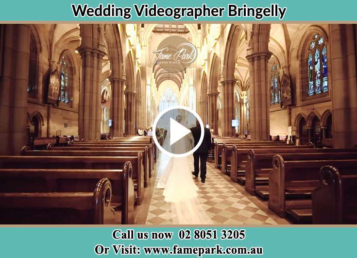 Bride walking at the aisle with her father Bringelly NSW 2216