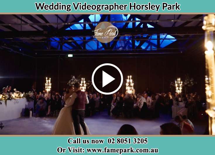 Bride and Groom looking at each other while dancing Horsley Park NSW 2175