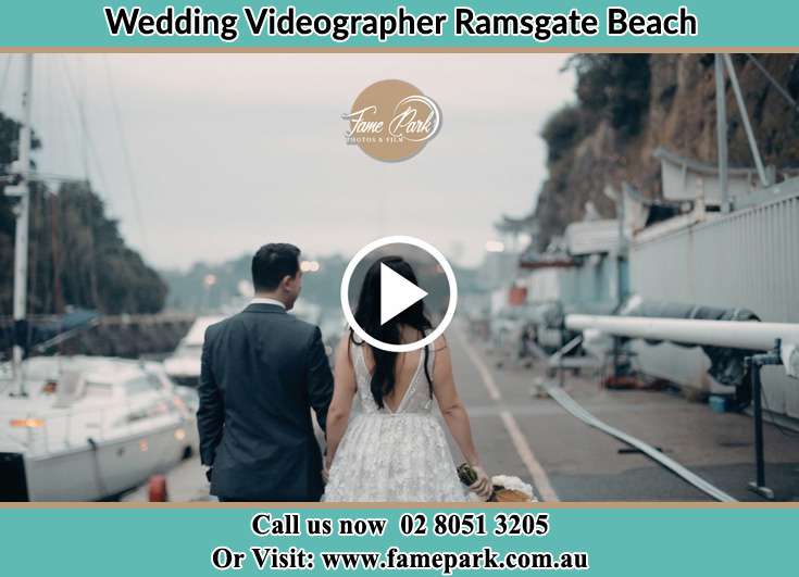 The Groom and the Bride walking in the pier Ramsgate Beach NSW 2217